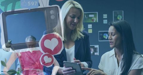 Business Women Collaborating in Modern Digital Workspace