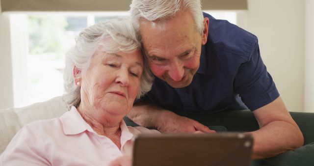 Senior Couple Using Digital Tablet at Home - Download Free Stock Images Pikwizard.com