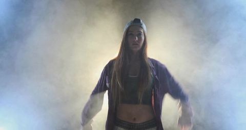 Dynamic Female Dancer with Intense Stage Presence