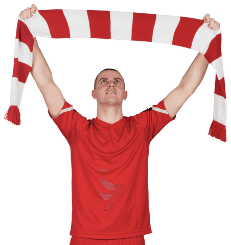 Football player celebrating with transparent red striped scarf raised