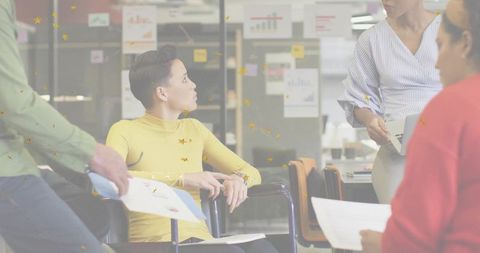 Inclusive team meeting in modern office setting