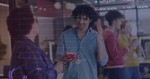 Jubilant Team with Digital Financial Data Overlay in Modern Office