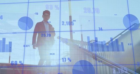 Businessman walking on staircase with data visualization projection