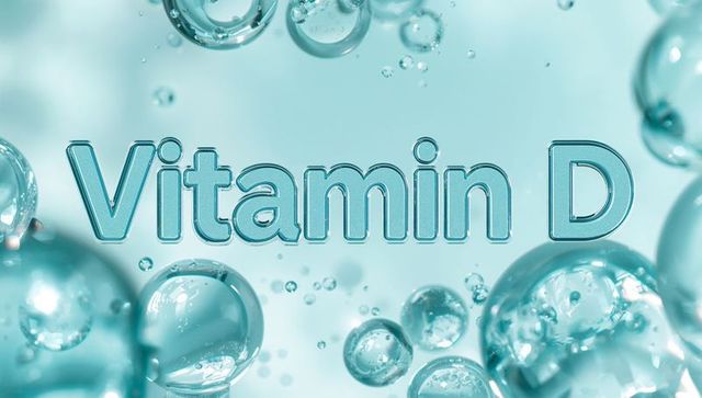 Glossy 3d vitamin d text floating among translucent aqua bubbles