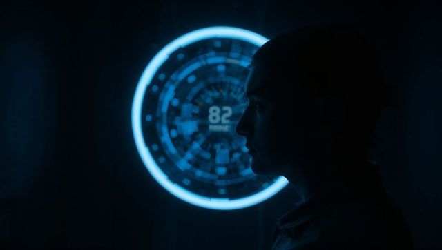 Silhouetted man studying holographic circular hud with glowing blue interface displaying 82