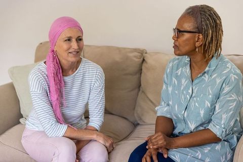 Diverse Older Women Engaging in Empathetic Conversation at Home