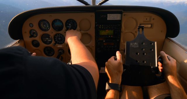 Hands Maneuvering Aircraft Cockpit Control Panel In Daylight - Download Free Stock Images Pikwizard.com