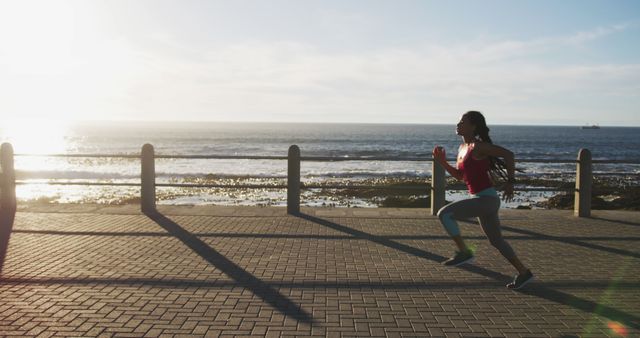 Outdoor Enthusiast Running Near Ocean at Sunrise - Download Free Stock Images Pikwizard.com