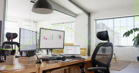 Modern wooden workstation featuring dual monitors, laptop and ergonomic chair in loft office