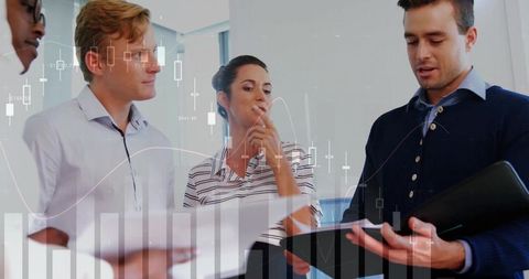 Business team analyzing financial charts in collaborative meeting with tablet and reports