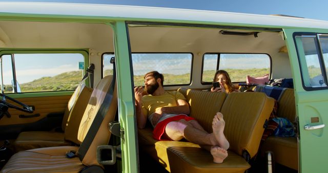 Friends Relaxing in Retro Van on Road Trip Adventure - Download Free Stock Images Pikwizard.com