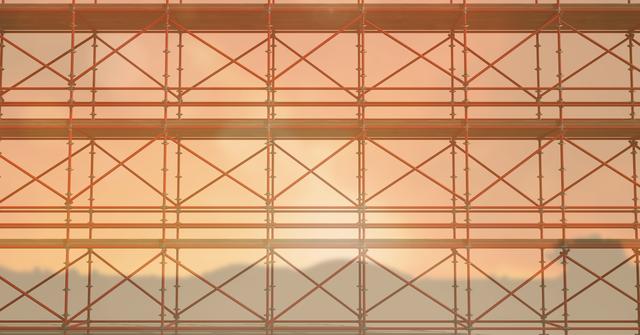 Digital composite of 3D red scaffolding whit the sunset