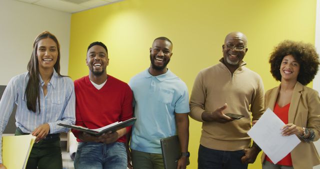 Diverse Group of Colleagues Smiling in Bright Office - Download Free Stock Images Pikwizard.com