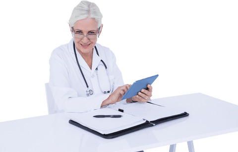 Smiling female doctor using transparent tablet in office environment