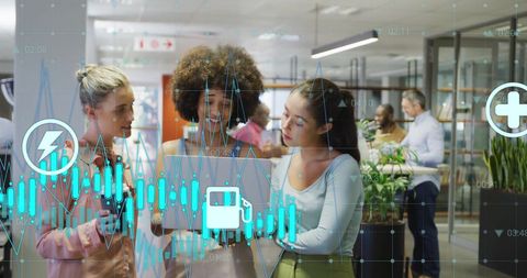 Diverse Group of Colleagues Analyzing Data in Modern Office