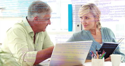 Business Professionals Collaborating with Technology Insights