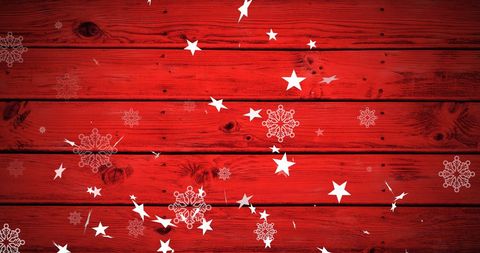 Festive Snowflakes and Stars Over Red Wooden Background