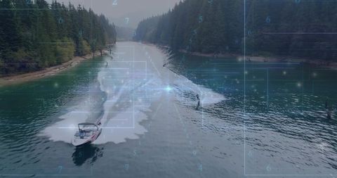 Wakesurfing behind speeding motorboat in forest inlet with digital hud overlay
