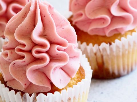 Delicious vanilla cupcakes with pink buttercream frosting