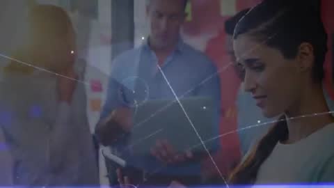 Futuristic Team Analyzing Digital Network in Collaborative Meeting