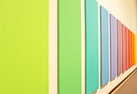 Abstract rainbow colored panels on gallery wall design