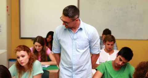Instructor Engaging with University Students in Classroom - Download Free Stock Images Pikwizard.com
