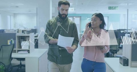 Professionals walking through open office discussing analytics with floating data charts overlay