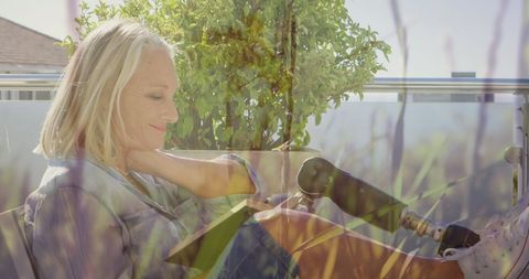 Woman with Artificial Leg Relaxing Outdoors in Nature