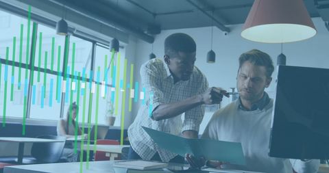 Team Analyzing Financial Data on Computer in Modern Office