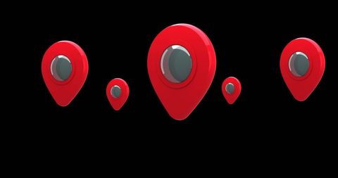 Digital red map pins floating against black background