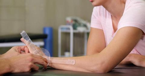 Physical Therapist Measuring Range of Motion in Woman's Elbow - Download Free Stock Images Pikwizard.com