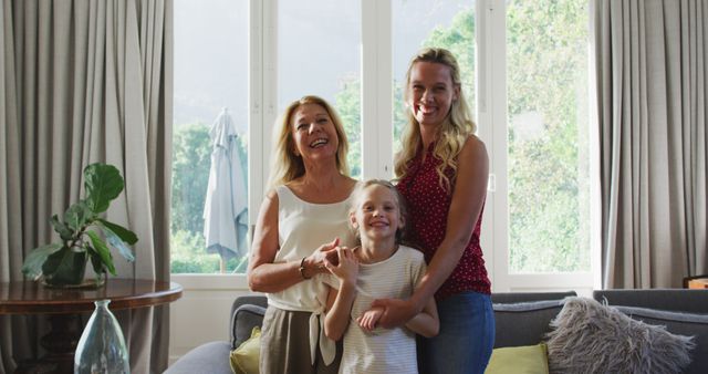 Happy Multigenerational Family Posing in Bright Living Room - Download Free Stock Images Pikwizard.com