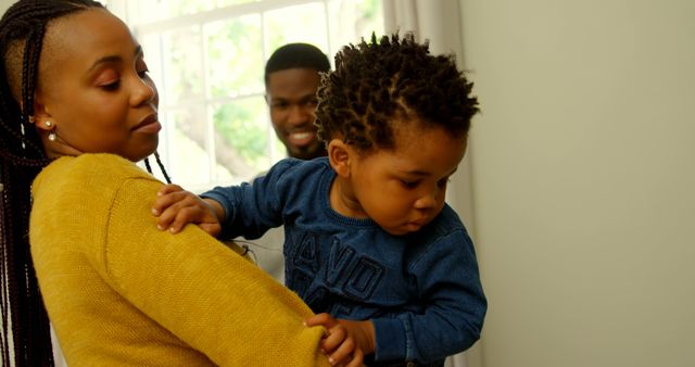 Young African American Family Enjoying Quality Time at Home - Download Free Stock Images Pikwizard.com