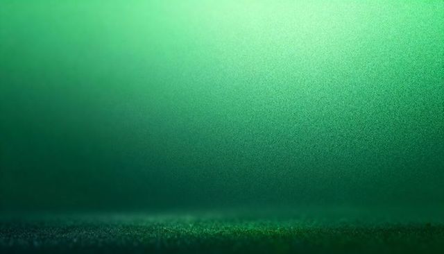 Emerald grainy texture backdrop with soft horizon and subtle sparkle