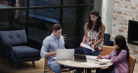 Focused Professionals Collaborating in Modern Office Setting - Download Free Stock Images Pikwizard.com