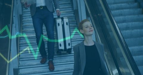 Business Professionals on Escalator with Finance Graphics Overlay