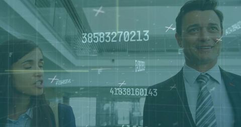 Business colleagues walking through modern lobby with augmented reality hud overlay
