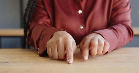 Professional Executives Discussing Business Ideas at Work Desk