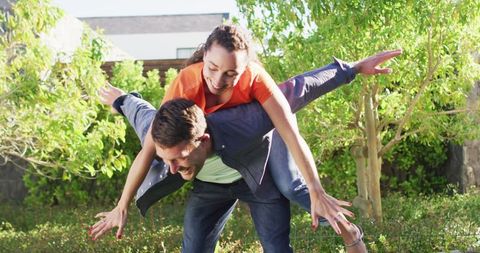 Joyful Couple Having Fun Outdoors with Playful Gesture - Download Free Stock Images Pikwizard.com