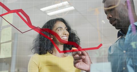 diverse coworkers analyzing falling graph for strategy planning - Download Free Stock Images Pikwizard.com