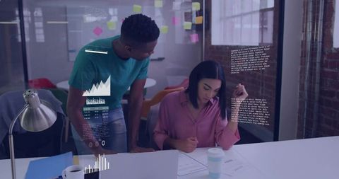 Colleagues Collaborating in Modern High-Tech Office Setting