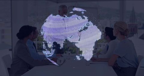 Business team discussing holographic globe and global strategy in futuristic boardroom