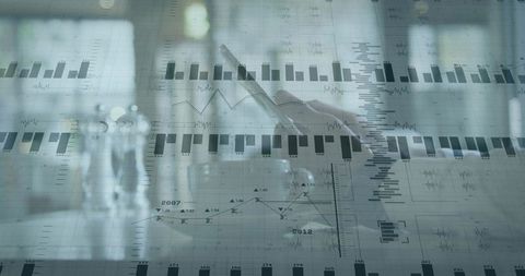 Tapping smartphone overlaid with financial charts and analytics for business insights