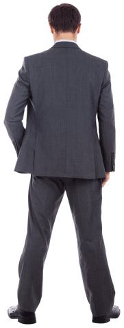 Confident Businessman in Suit with Hand on Hip, Rear View Transparent