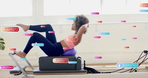 Pilates reformer core workout with small stability ball strengthening balance and posture