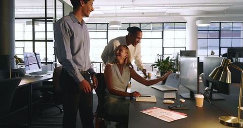 Diverse Office Team Celebrating Successful Business Milestone