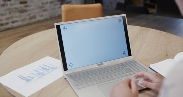 Person Testing Software on Laptop at Wooden Table - Download Free Stock Images Pikwizard.com