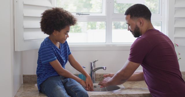 Father Teaching Son Handwashing in Kitchen Sink - Download Free Stock Images Pikwizard.com