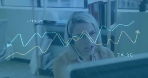 Businesswoman Analyzing Data with Graph Overlay in Modern Office