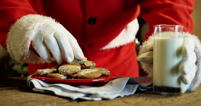 Santa Enjoying Christmas Cookies with Glass of Milk - Download Free Stock Images Pikwizard.com